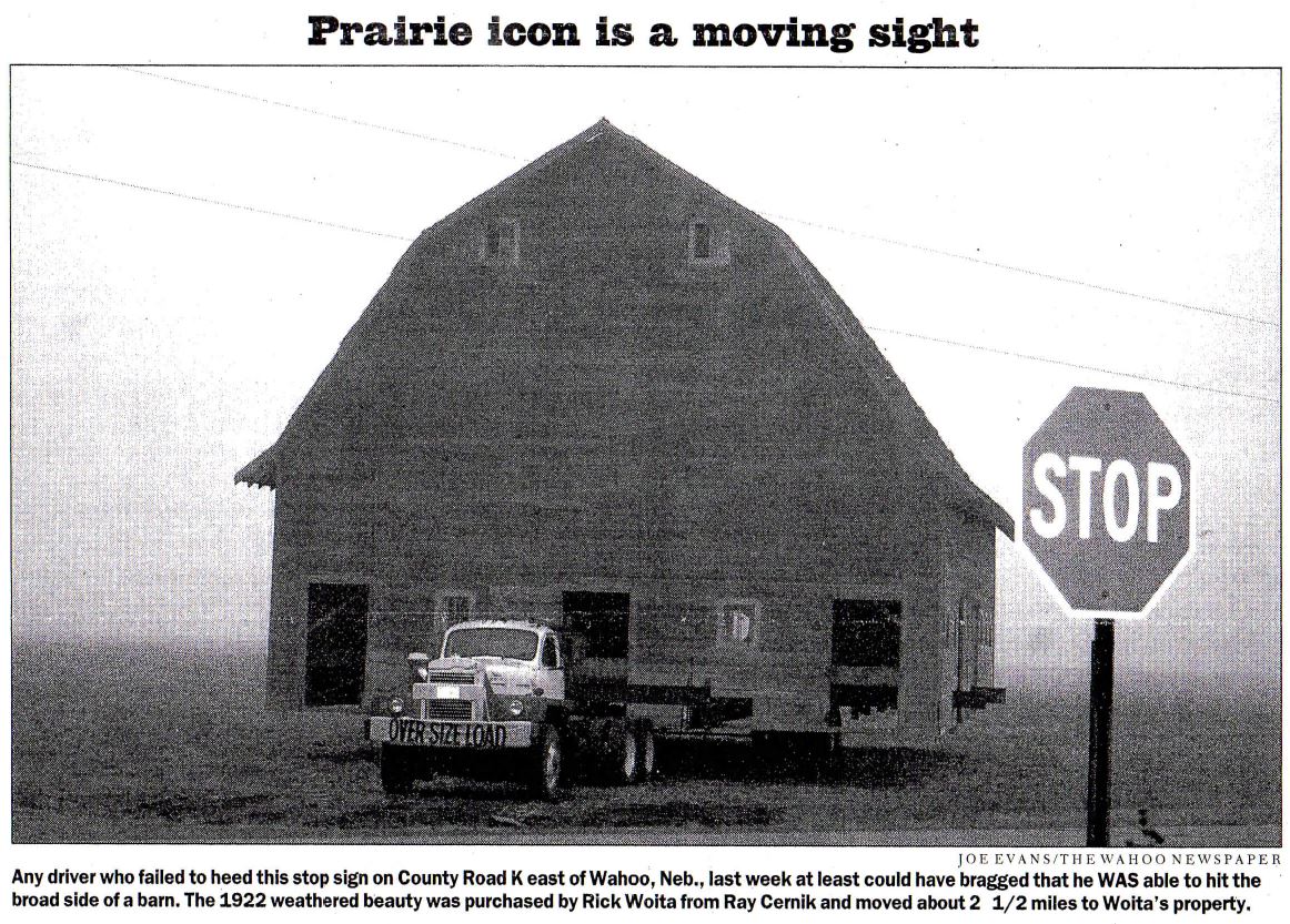 The original barn being moved
